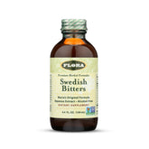 Flora Swedish Bitters bottle pour showing convenient before meals use for digestion.