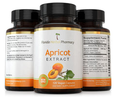 Apricot capsules in a cup for easy daily intake - Florida Herbal Pharmacy.