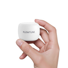 FlowTUNE mini sound machine with portable design for travel and home use.