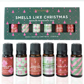 Folkulture Christmas essential oils set in diffuser bottles for a festive home scent.