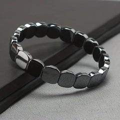 Fqwrus Hematite Bracelet Men on wrist demonstrates stretch fit for everyday wear.