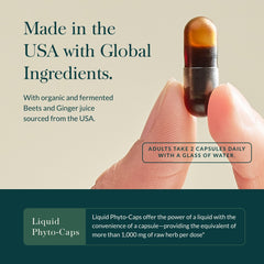 Gaia Herbs Ginger-Beet Postbiotic capsules closeup ready for daily use.