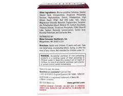 Geritol Complete tablets being dispensed for easy daily use.