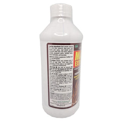 Germa Malt Extract bottle-pour showing easy mixing into drinks.
