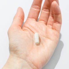 GNC Probiotic Solutions capsules appear as easy-to-swallow vegetarian capsules