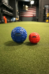 GolgiStim Large Trigger Point Ball on back for relieving tight back knots.