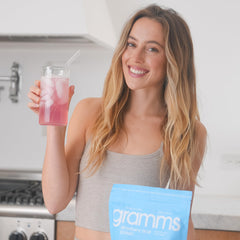 GRAMMS clear protein pour into water highlighting quick refreshing mix