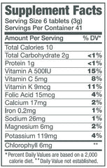 Closeup of Green Foods Original Green Magma barley grass tablets showing vibrant greens