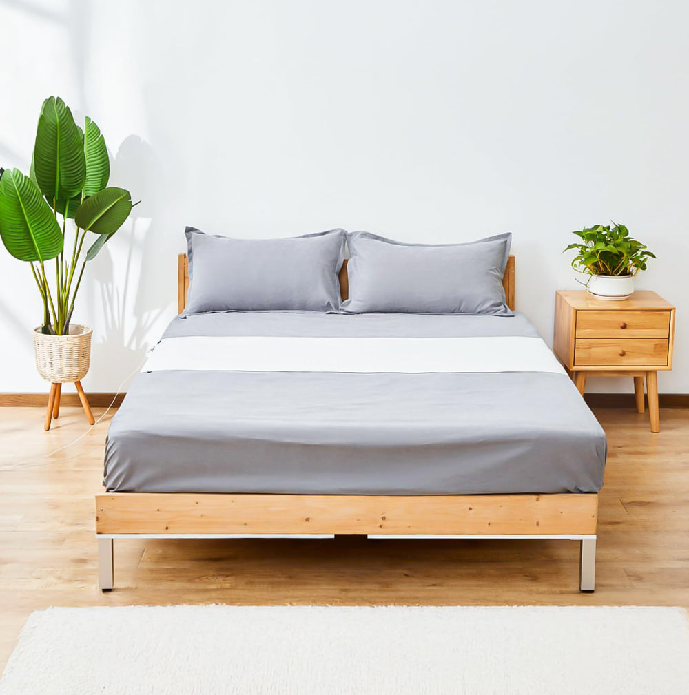 GroundingWell grounding sheet with silver weave close-up highlighting conductivity for restful nights