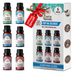 GuruNanda Tranquility oil bottle beside a diffuser for a calming aromatherapy space
