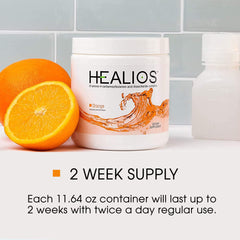 Healios orange flavor dissolving in glass yields smooth texture for use.
