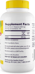 Healthy Origins Inositol Powder bottle closeup showing powder texture and label.