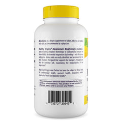 Healthy Origins Magnesium Bisglycinate Chelate tablets close-up beside a glass for daily use.