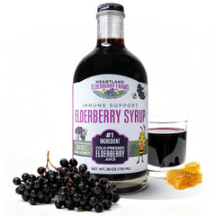 Heartland Organic Elderberry Syrup bottle front with rich color signaling immune support.