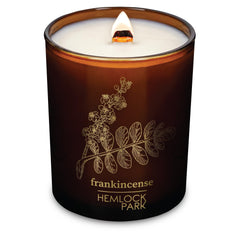 Hemlock Park frankincense candle with wood wick for calm ambience.