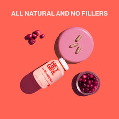 Label closeup shows natural cranberry, hibiscus, and dandelion blend for urinary support.