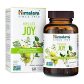 Himalaya Hello Joy bottle on wood surface promotes a positive outlook.