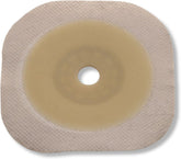 Hollister 14604 flat Flextend barrier with beige floating flange reduces abdominal pressure during pouch attachment.