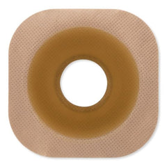 Hollister barrier with beige floating flange to ease abdominal pressure during changes.