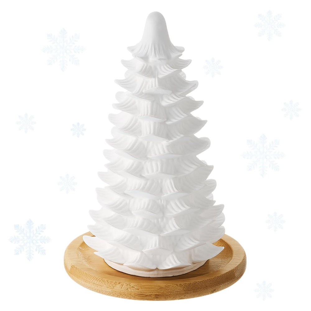 Honeydak Christmas tree diffuser on white ceramic for festive ambiance.