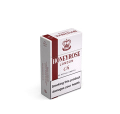 Honeyrose Cherry-flavored herbal cigarettes close-up, natural ingredients for a mindful break.