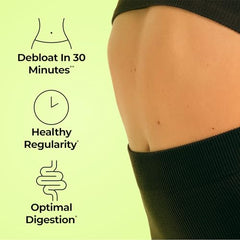 Closeup of HUM Flatter Me capsules highlighting the fast-acting enzyme blend.