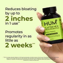HUM Flatter Me capsules closeup highlighting the vegan enzyme blend.