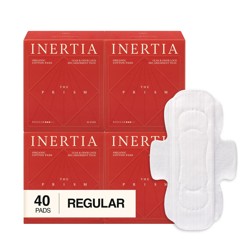 Inertia Prism Red pads pack front view showing discreet, eco-friendly protection for daily wear.