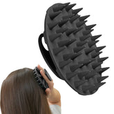 INNERNEED scalp massager brush held in hand for deep cleansing and soothing scalp.