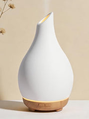 InnoGear essential oil diffuser in white ceramic vase, front view for elegant home ambience.