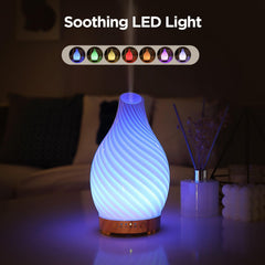 Inrorans ultrasonic diffuser emits a gentle mist for calming ambiance.