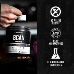 Jacked Factory BCAA Powder Fermented Fruit Punch glass shows a bright, refreshing workout drink.