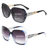 JM bifocal sunglasses with oversized square frame in black and blue for outdoor reading and style.