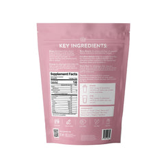 JUST INGREDIENTS Pre-Workout Raspberry Lemonade scoop beside glass for easy mixing