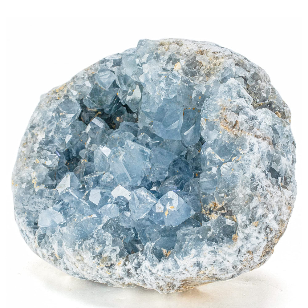 KALIFANO Celestite geode cluster in sky blue hues promotes calming space.