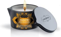 KAMA SUTRA Ignite coconut pineapple candle pours warm massage oil for relaxation.