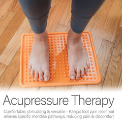 Kanjo mat in standing posture provides gentle acupressure during work.