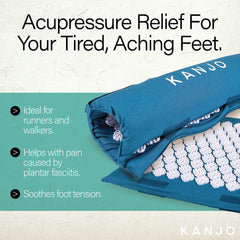 Close-up of Kanjo acupressure stimulators targeting foot pressure points.