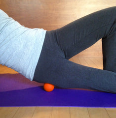 Kieba lacrosse balls orange compact pair for travel and on-the-go massage.