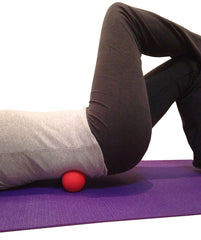 Kieba blue lacrosse ball on neck muscles for tension release
