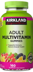 Kirkland dCDtdm bottle front shows gummies, a tasty daily source of essential vitamins.
