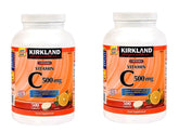 Kirkland Vitamin C tangy orange chewables bottle front view, convenient daily immune support