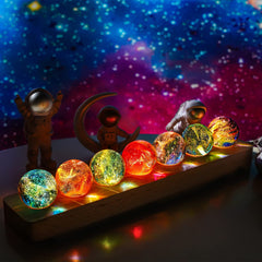 KRISININE LED wooden base illuminates seven chakra spheres for meditation ambiance