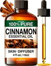 KUKKA Cinnamon Oils diffuser bottle emitting warm aroma for aromatherapy sessions.