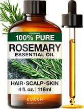 KUKKA Rosemary essential oil bottle being poured for hair nourishment.