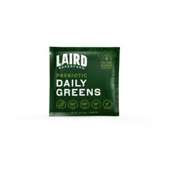 Laird Superfood Prebiotic Daily Greens powder close-up ready to mix.