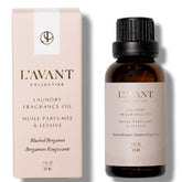 L'AVANT Collective Blushed Bergamot Laundry Oil bottle for fresh laundry aroma.