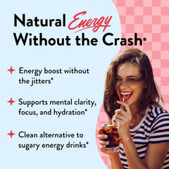 Legendairy Milk She's Electric cola powder being stirred into water for a refreshing boost.