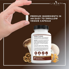 Liberty Lifestyle Lions Mane pour-shot, bottle pouring into glass for easy daily dosage.