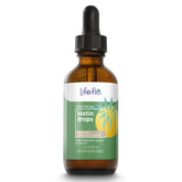 Life-Flo Biotin Drops bottle on a kitchen counter for daily use.